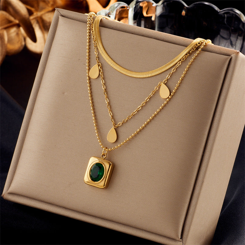 Conjunto Majestade Esmeralda – Brincos e Colar em Aço Titânio